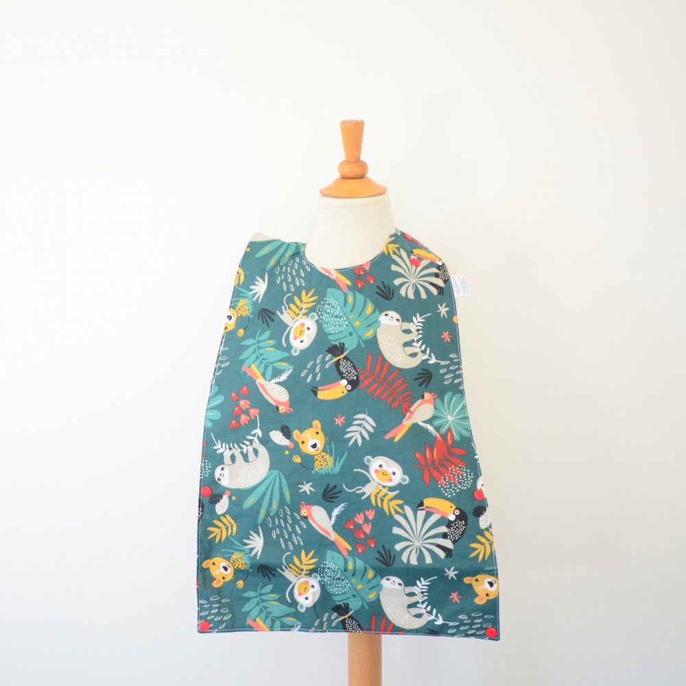 Bavoir bebe imperméable plastifié et réversible avec poche motif scooter et jungle--2227361713402